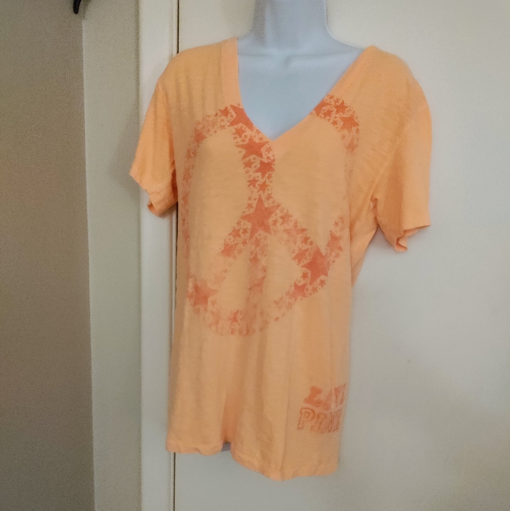 ✨️PINK by VS- orange V-neck T-shirt w/ a peace sign made from stars - size M